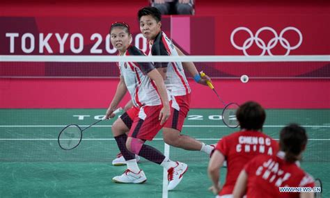 Sertifikat, penghargaan, tanda, atau dokumen yang dipajang di badminton olympic games tokyo 2020 lewat gift Voucher Code cashback langsung